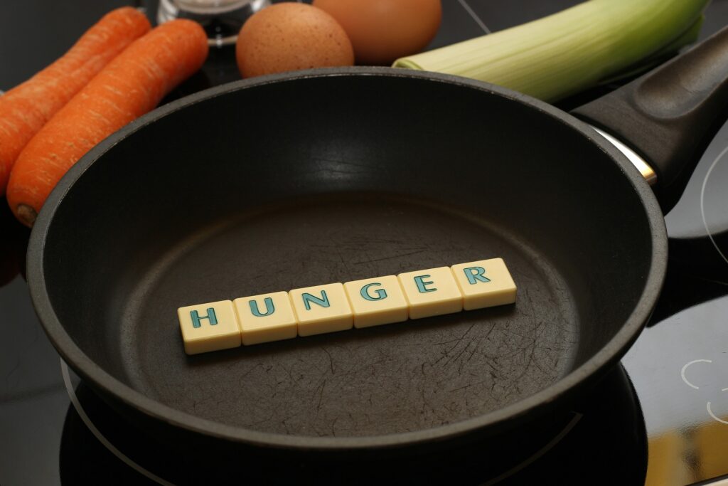 Sleep deprivation can lead to hunger pangs.